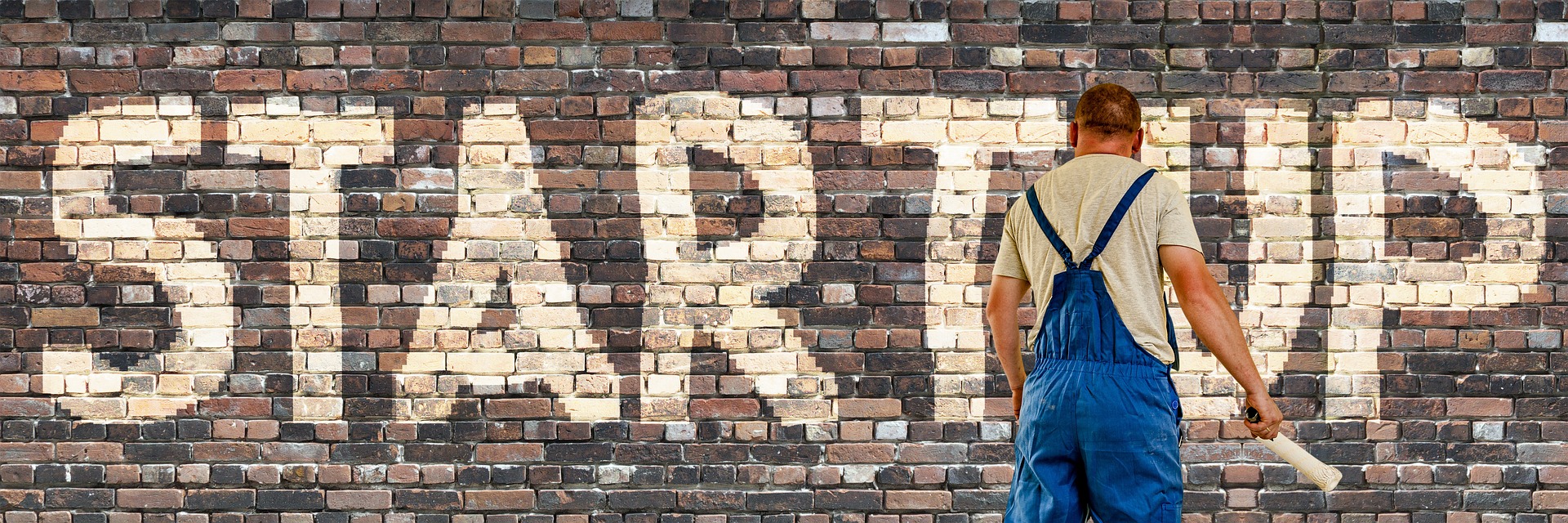 man writing a startup-wall
